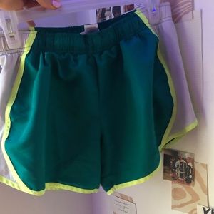 green athletic shorts